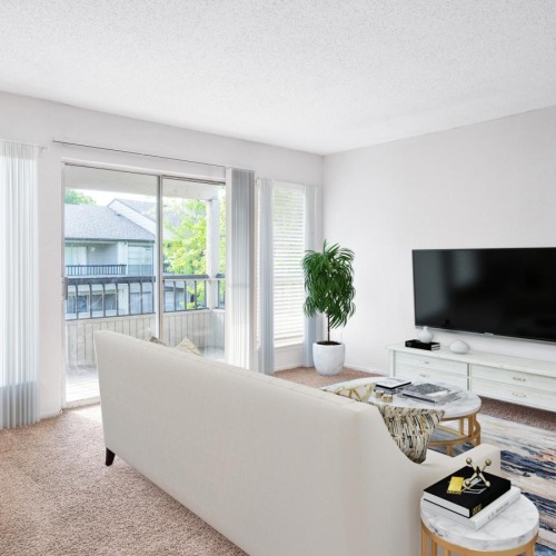 Beautiful living areas to match your lifestyle a living room with a tv and couches