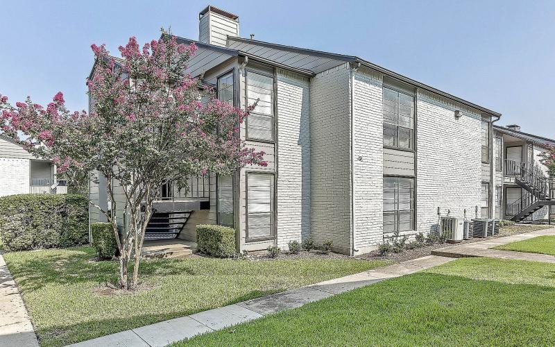 a house with a tree in the front